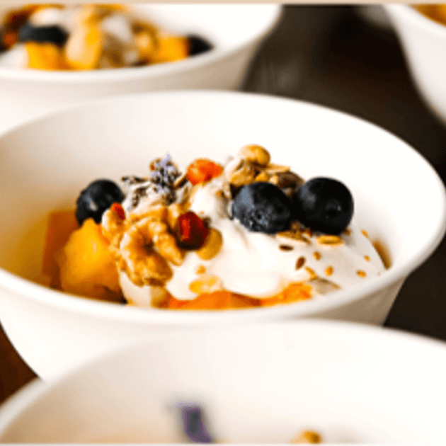 Load image into Gallery viewer, Breakfast fruit platter with muesli - Surf &amp; Underwater Training with Nette, Augusto &amp; Erika (Women Only) - Surfing &amp; Yoga - Retreat - Zhoola
