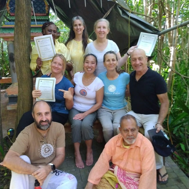 Load image into Gallery viewer, Group of yoga enthusiasts striking a pose for a photo - Back to your Roots at Nevis with Amanda Parr - VendorYoga &amp; Scuba Diving - RETREAT - Zhoola
