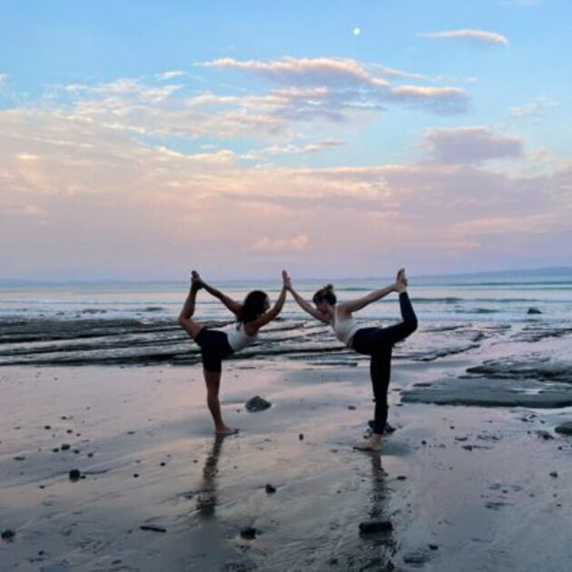 Load image into Gallery viewer, Yoga practitioners in a serene sunset setting - Myth Immersion with Julie Dohrman - Yoga &amp; Exploration - Retreat - Zhoola

