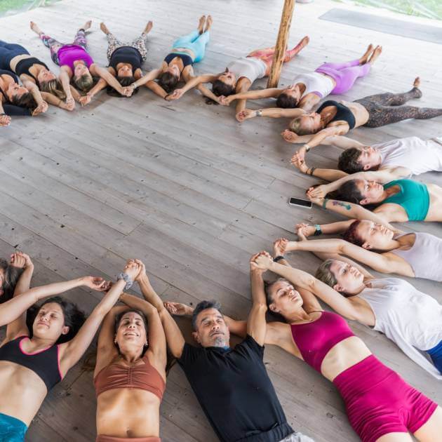 Load image into Gallery viewer, Yoga tribe holding hand - Arenal Volcano &amp; Punta Islita with Cathy Madeo - Yoga &amp; Exploration - RETREAT
