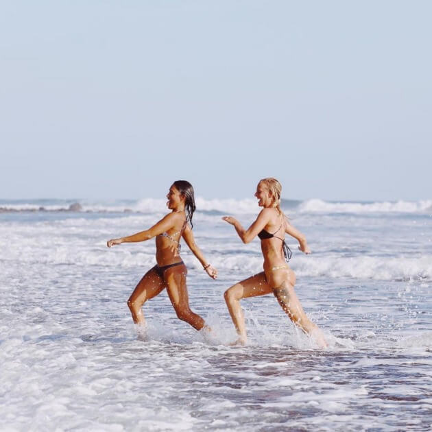 Women Running On The Beach - Surf, Yoga & Empowerment with Nette (Women Only) - Surfing & Yoga - Retreat - Zhoola