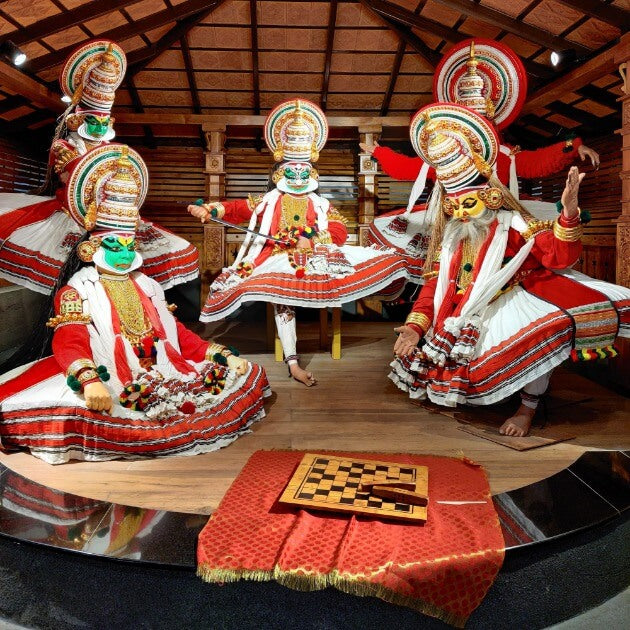 Traditional Kathakali dance performance in Kerala, India, showcasing vibrant Kathakali performers in intricate costumes and makeup, a major form of classical Indian art