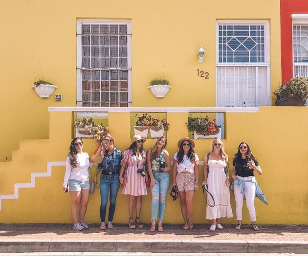 Women posing in front of a stylish wall -From the Beach to the Bush with Kiersten & Caity - VendorSafari & Exploration (Women only) - JOURNEY - Zhoola