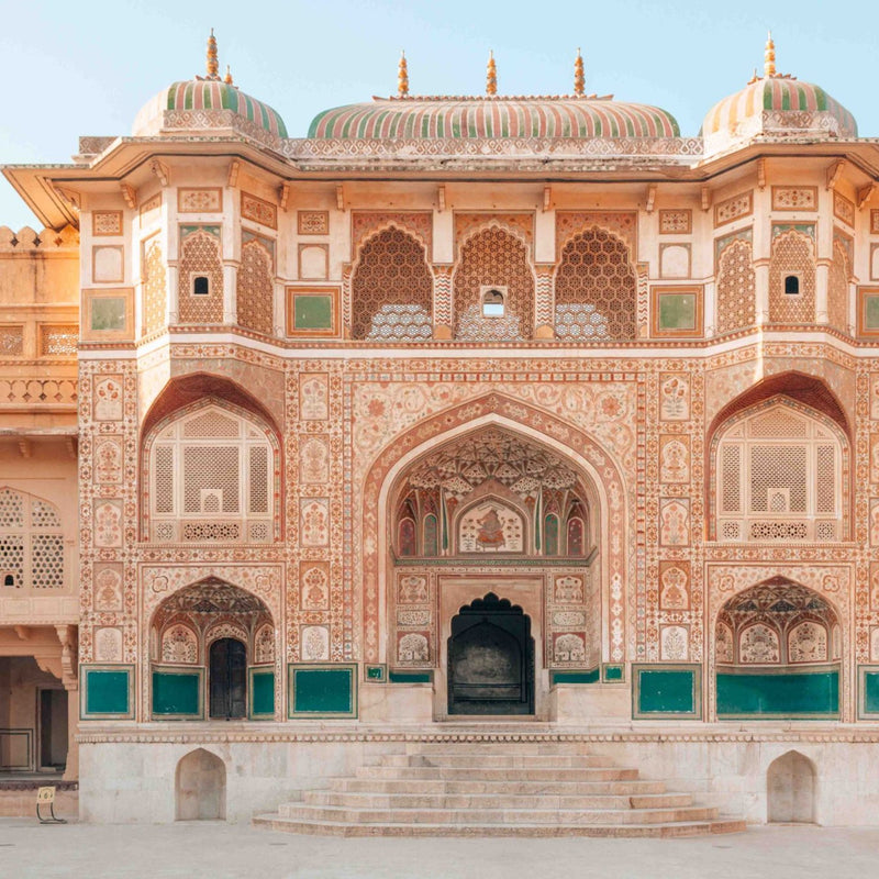 Load image into Gallery viewer, The impressive Amber Fort, a historic fortress and palace complex in Rajasthan, India.Signature India with Sandhya Balakrishnan - Yoga &amp; Exploration - Journey - Zhoola
