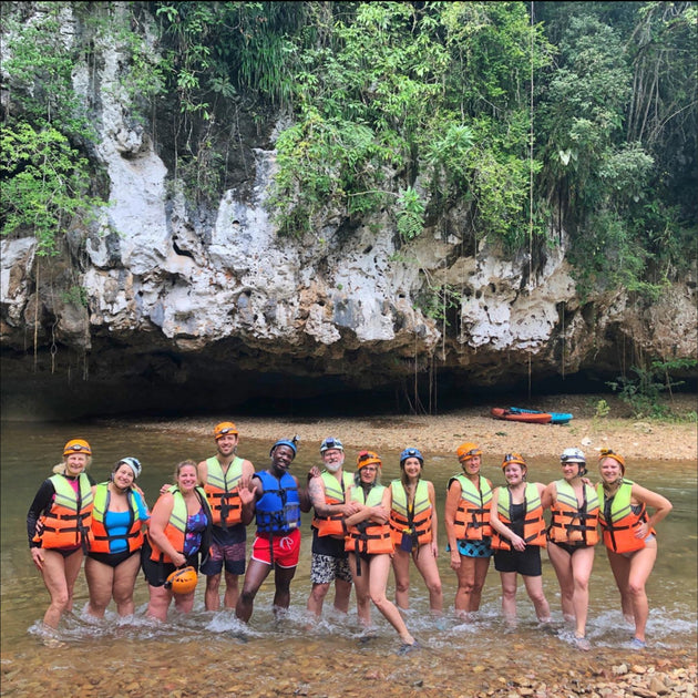 A group of happy friends wearing life jackets by the water -Reset & Reconnect with Thai James - Yoga & Exploration - Retreat - Zhoola