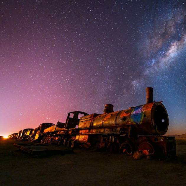 Load image into Gallery viewer, The Train Graveyard outside of Uyuni, Bolivia - Astro Photography with Colby Brown - Photography &amp; Hike - Workshop - Zhoola
