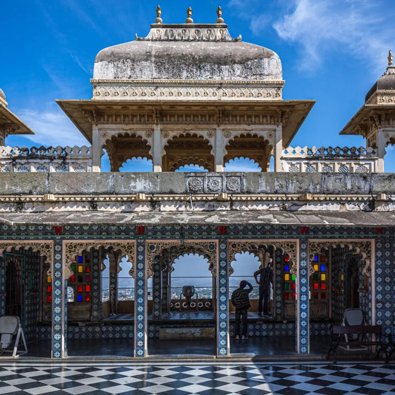 Load image into Gallery viewer, Courtyards, corridors, and pavilions within the Udaipur City Palace ComplexSignature India with Sandhya Balakrishnan - Yoga &amp; Exploration - Journey - Zhoola
