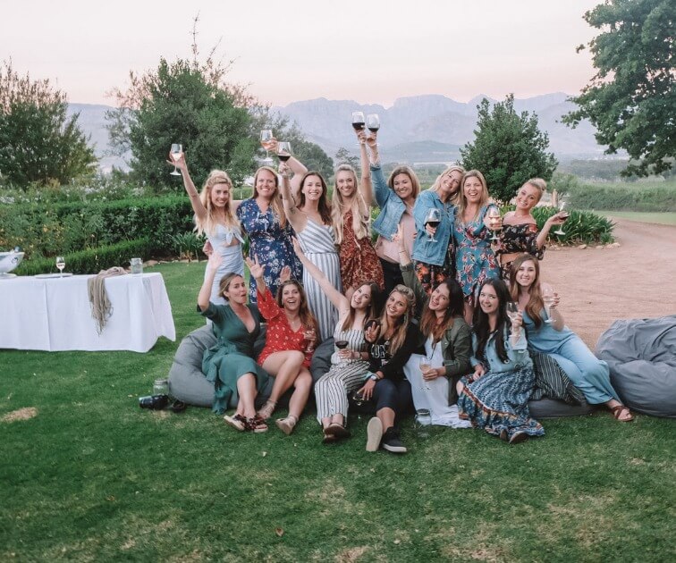 Load image into Gallery viewer, Ladies savoring and enjoying wine at Cape Winelands - From the Beach to the Bush with Kiersten &amp; Caity - VendorSafari &amp; Exploration (Women only) - JOURNEY - Zhoola
