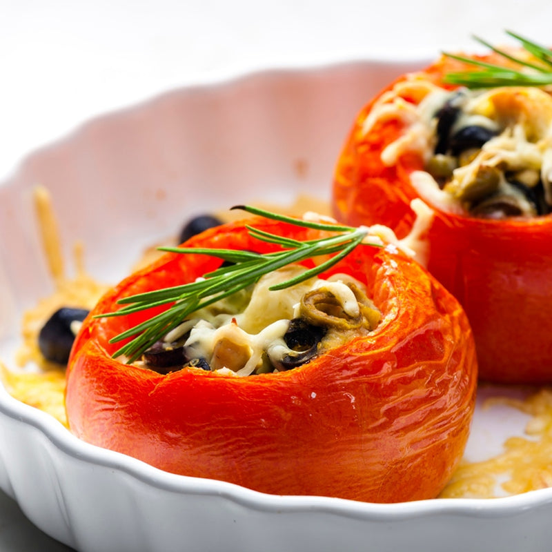 Load image into Gallery viewer, Stuffed Tomato with Savory Mushrooms and Melted Mozzarella CheeseTranquility and natural splendor with Nateea - Yoga and Safari - RETREAT - Zhoola
