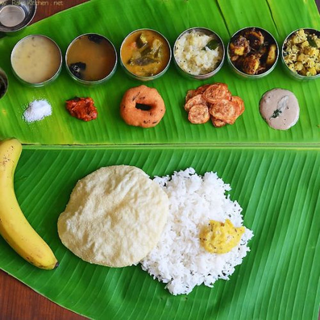 South indian meal served on banana leaf - Cultures of South India with Sandhya Balakrishnan - Yoga & Exploration - Journey - Zhoola