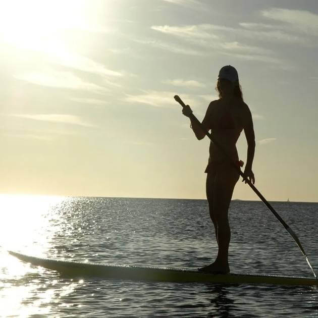 Load image into Gallery viewer, Stand Up Paddle Board yoga practice on the tranquil water . Back to your Roots at Nevis with Amanda Parr - VendorYoga &amp; Scuba Diving - RETREAT - Zhoola
